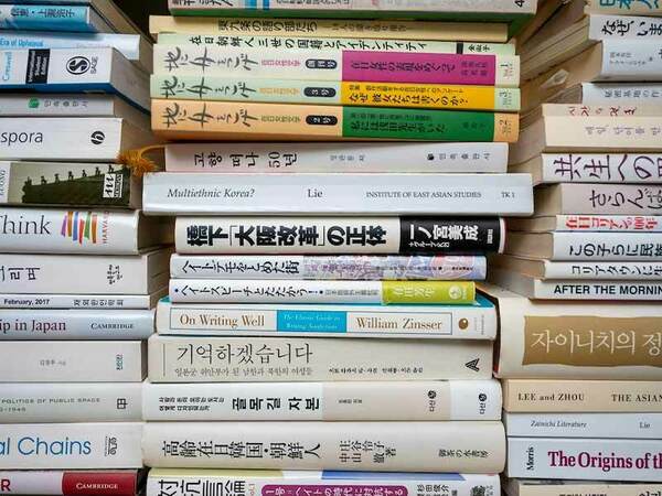 A stack of Korean and Japanese books.